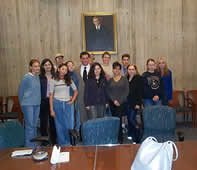 Students at a hostel-arranged meeting with Boston City Councilor Michael Ross